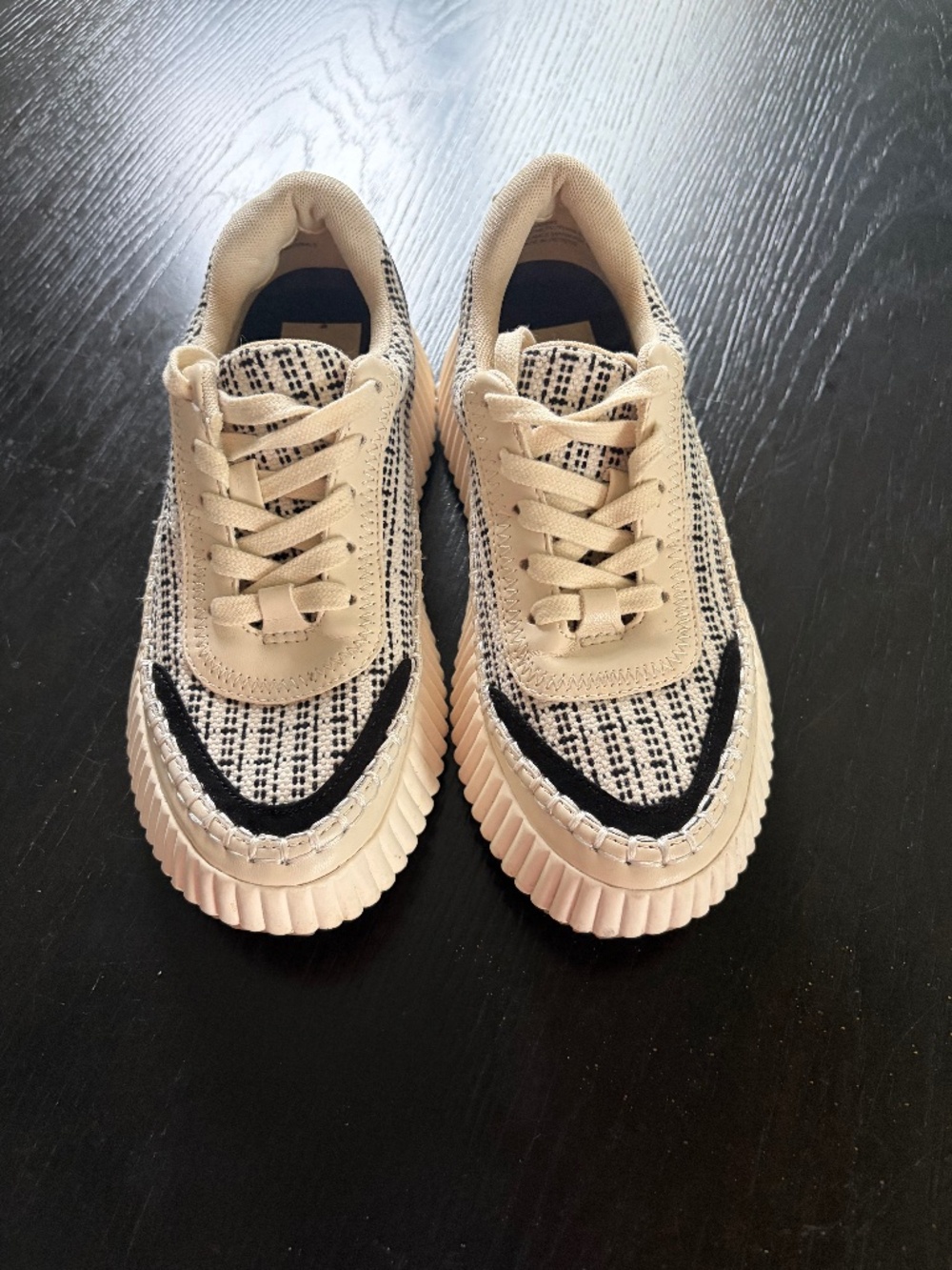 Dolce Vita Dannis black and cream tweed platform sneakers.